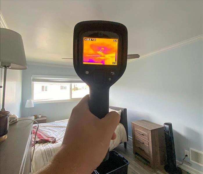 SERVPRO tech checking for moisture in a home in Otay Mesa, CA