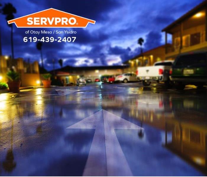 An apartment complex is shown after a heavy rainstorm.