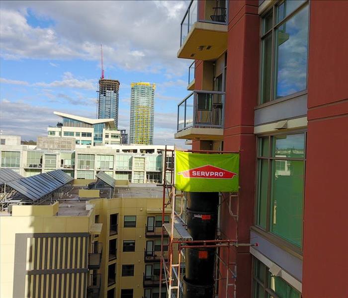 SERVPRO banner on the balcony of a San Ysidro apartment